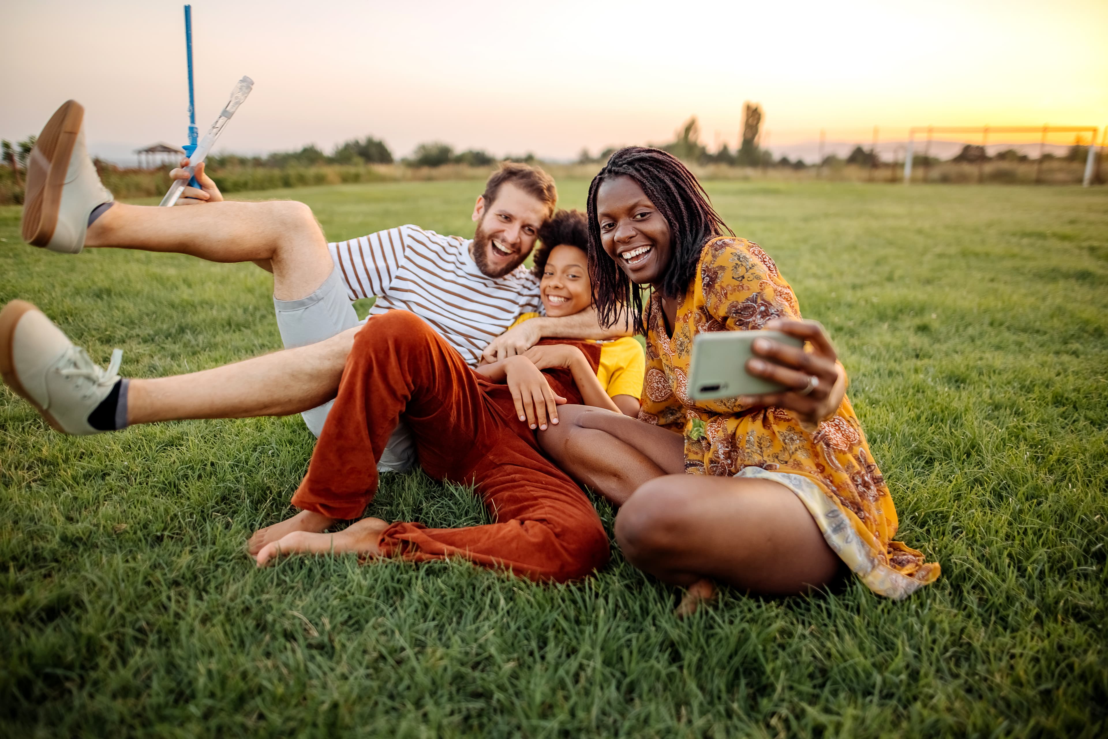 Family together playing in nature
