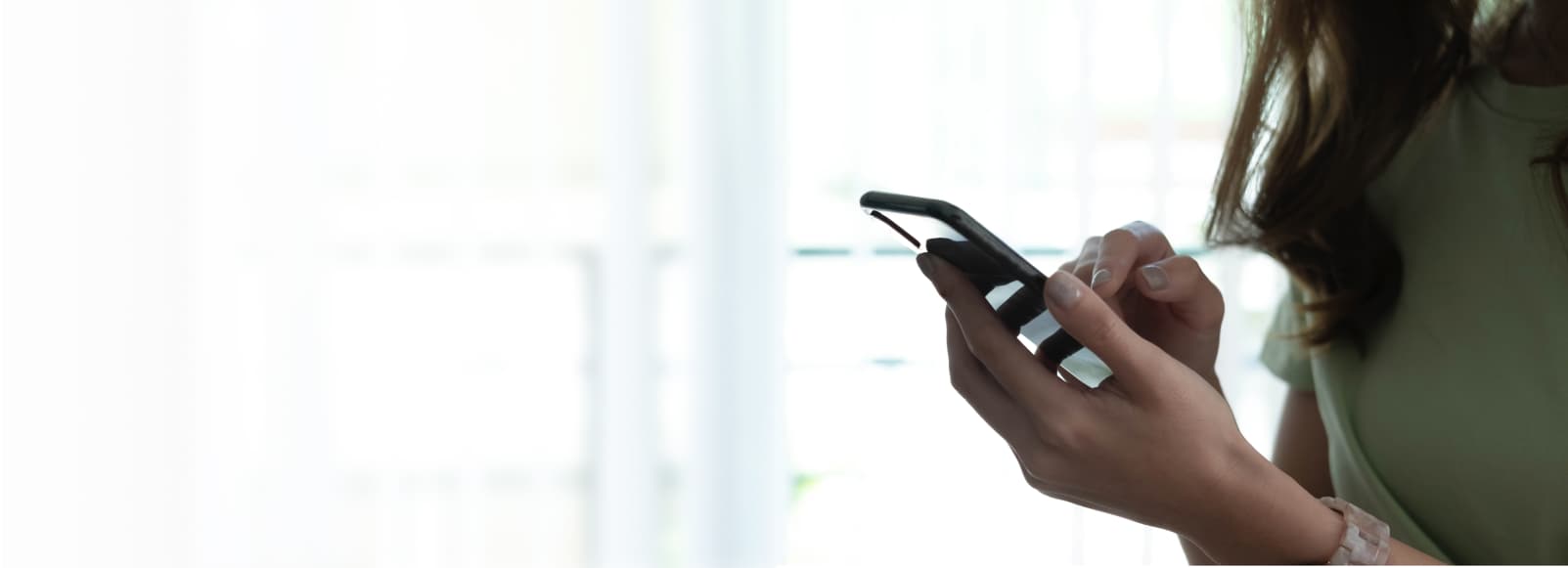 BH_Woman_Holding_Phone_Smartphone