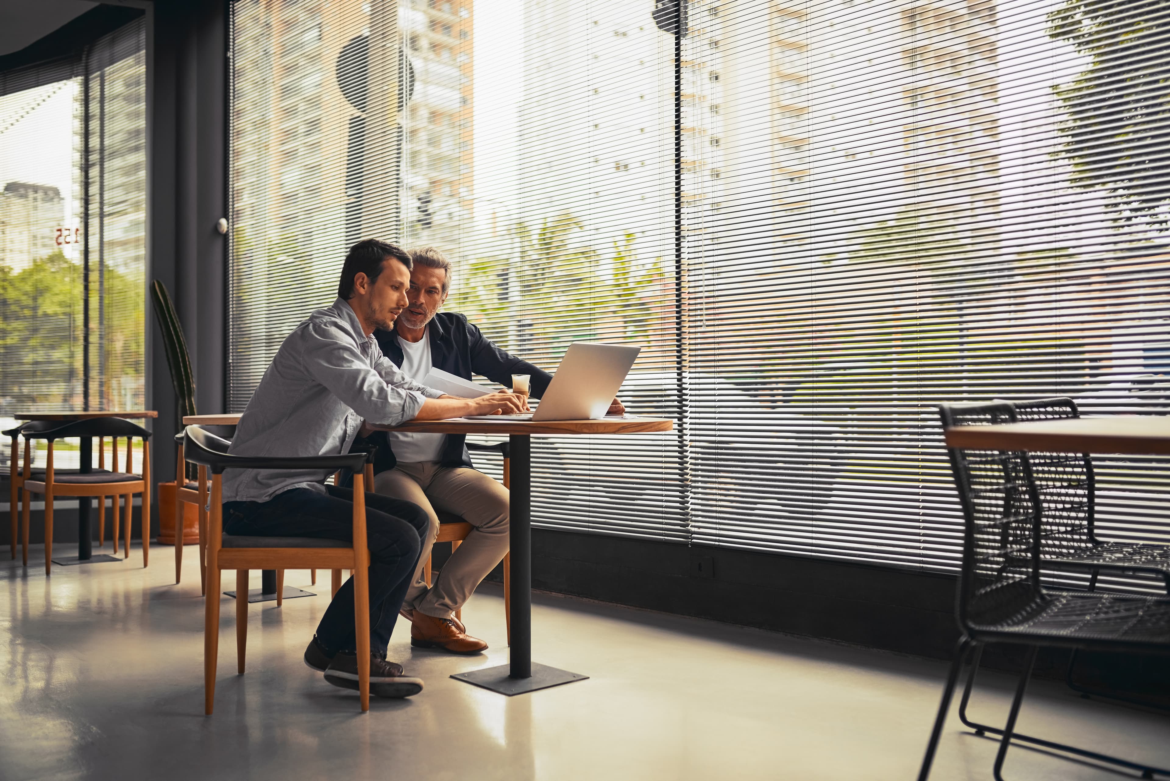 Shot of businessmen working together in the office