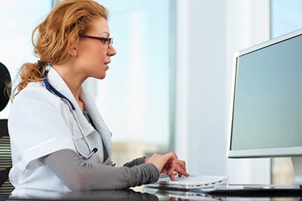 FemaleDoctorAtDesk