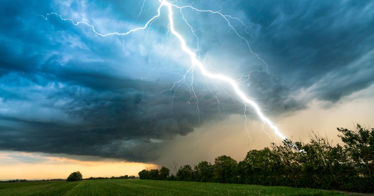 A stormy sky with a bolt of lightning.