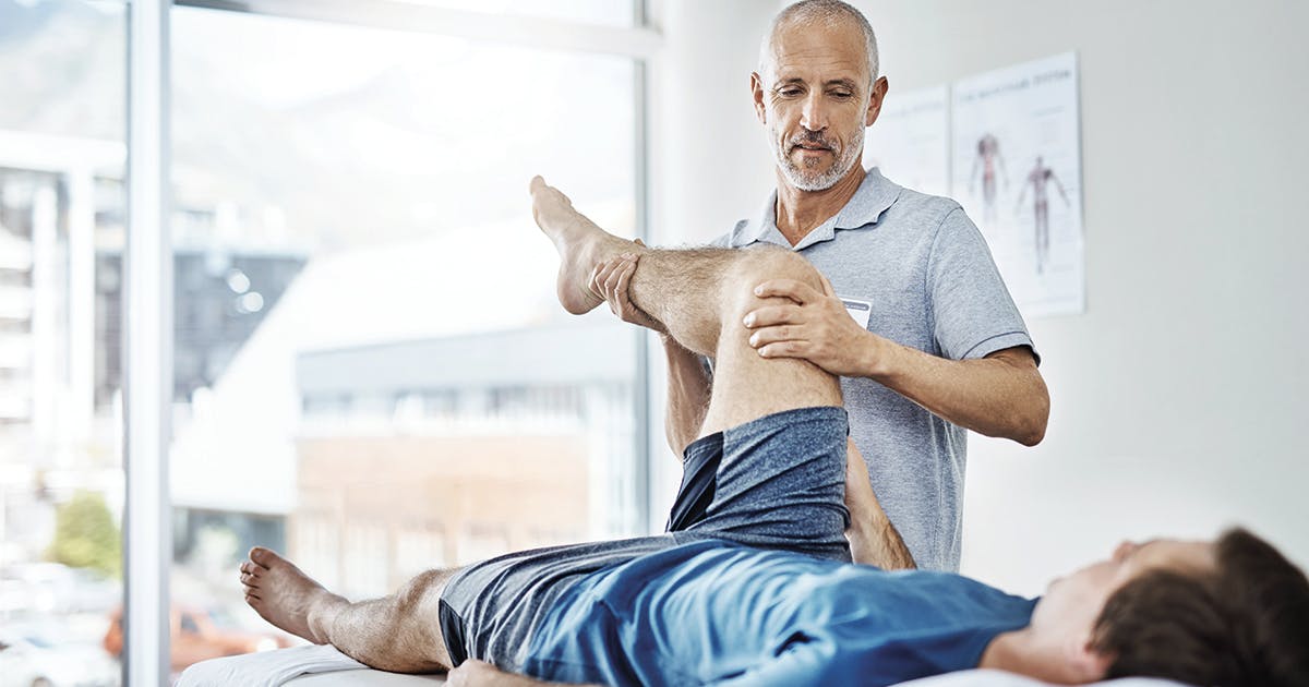 A man receiving physical therapy